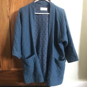 Curator Jules Cardigan